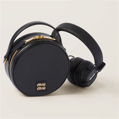 Marshall X Miu Miu headphones with leather case.